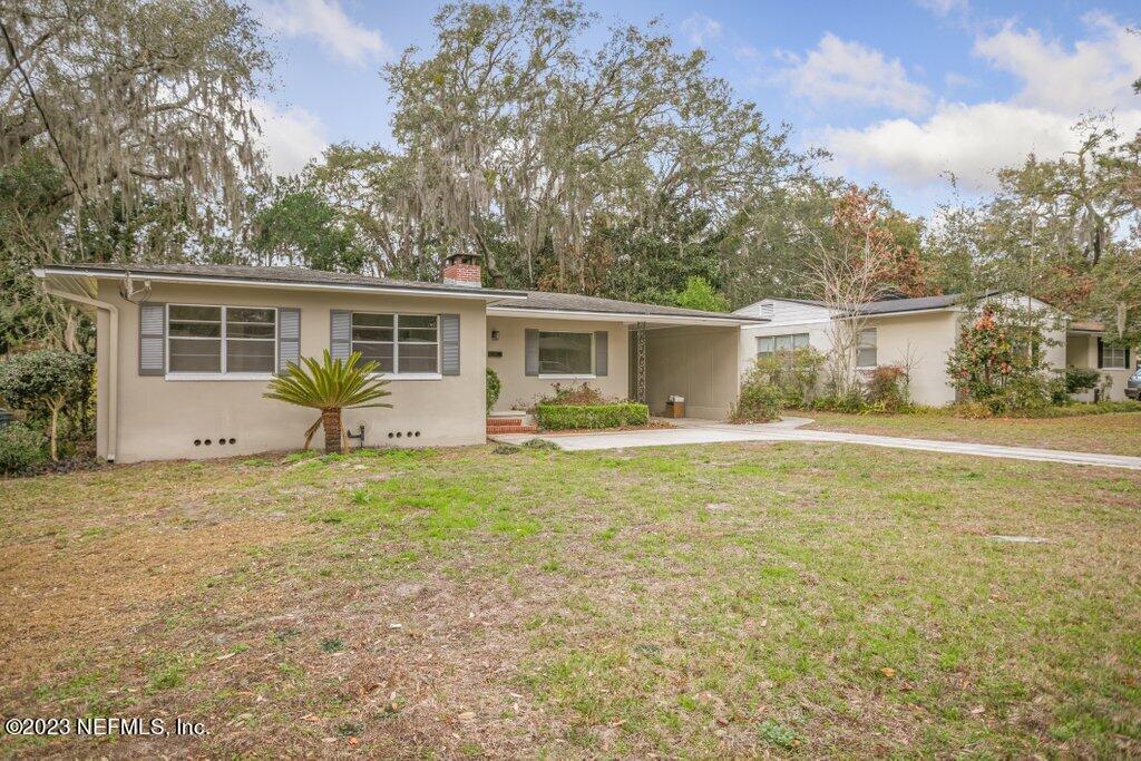 6404 Wesleyan Road Jacksonville, FL 32217 - Photo 4 of 45 a house view with a garden space