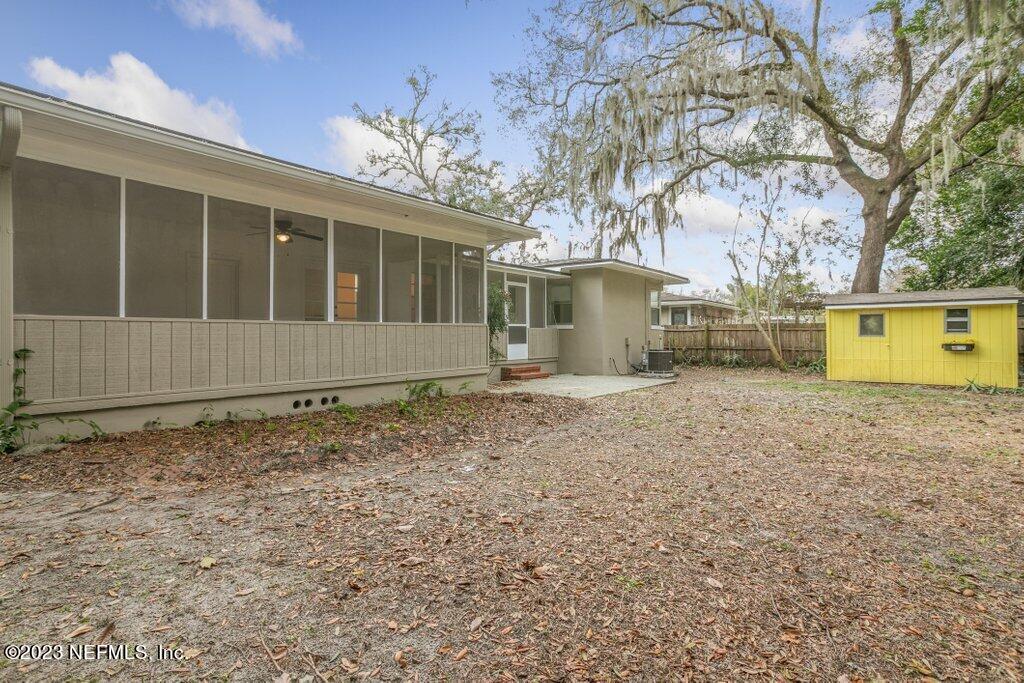 6404 Wesleyan Road Jacksonville, FL 32217 - Photo 43 of 45 a house with trees in the background