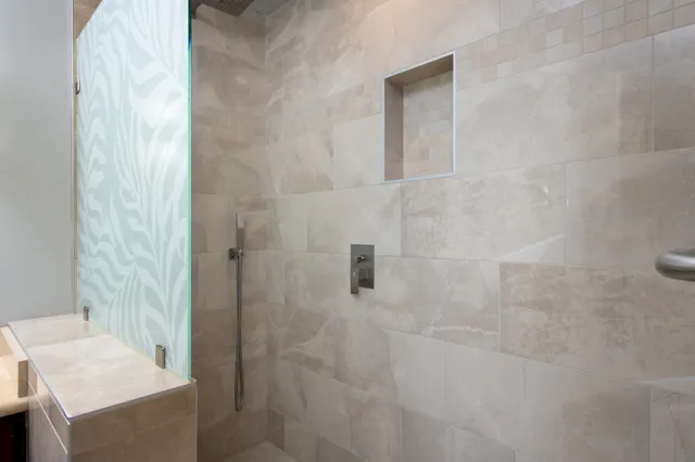 a bathroom with a sink and a shower