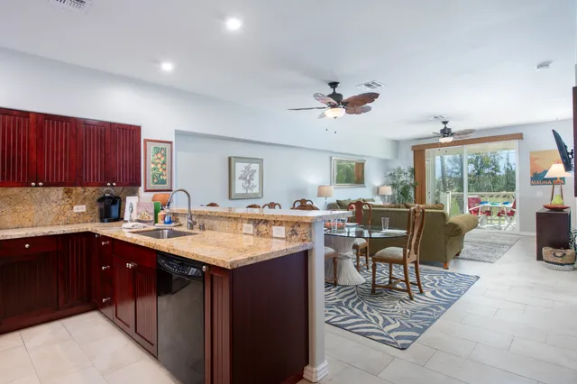 a kitchen with cabinets and sink