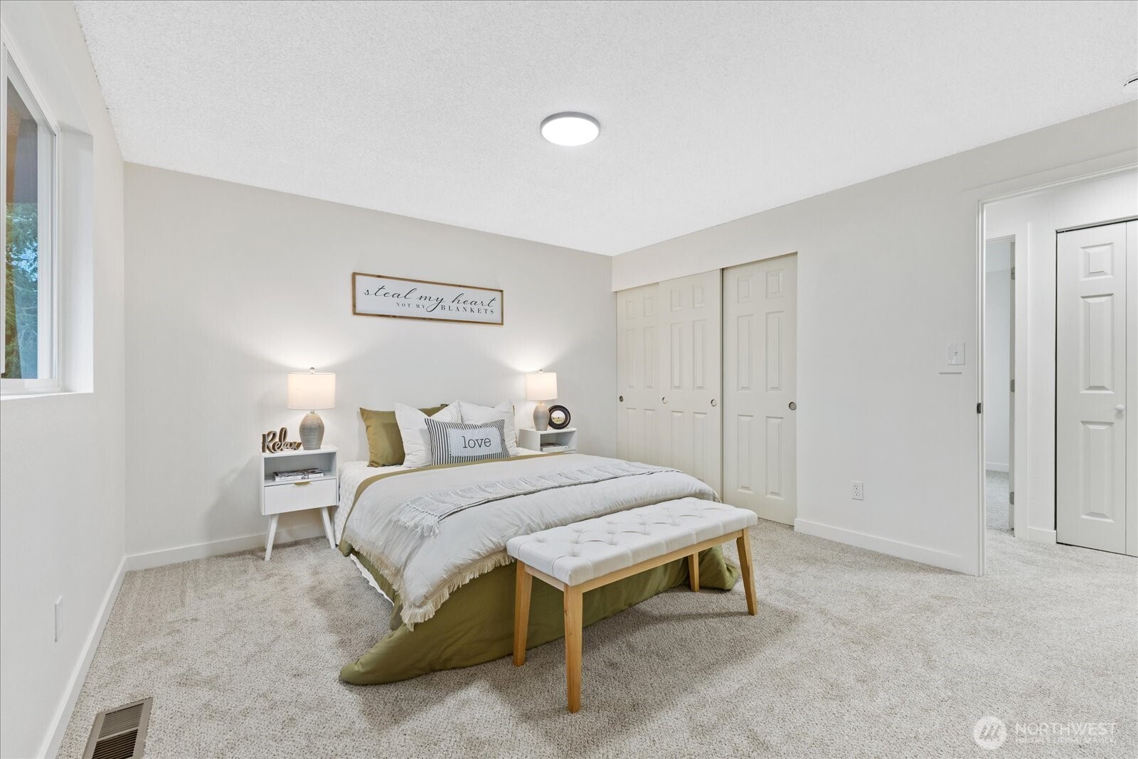 34515 25th Avenue Southwest Federal Way, WA 98023 - Photo 11 of 31 a bedroom with a bed and a table in it