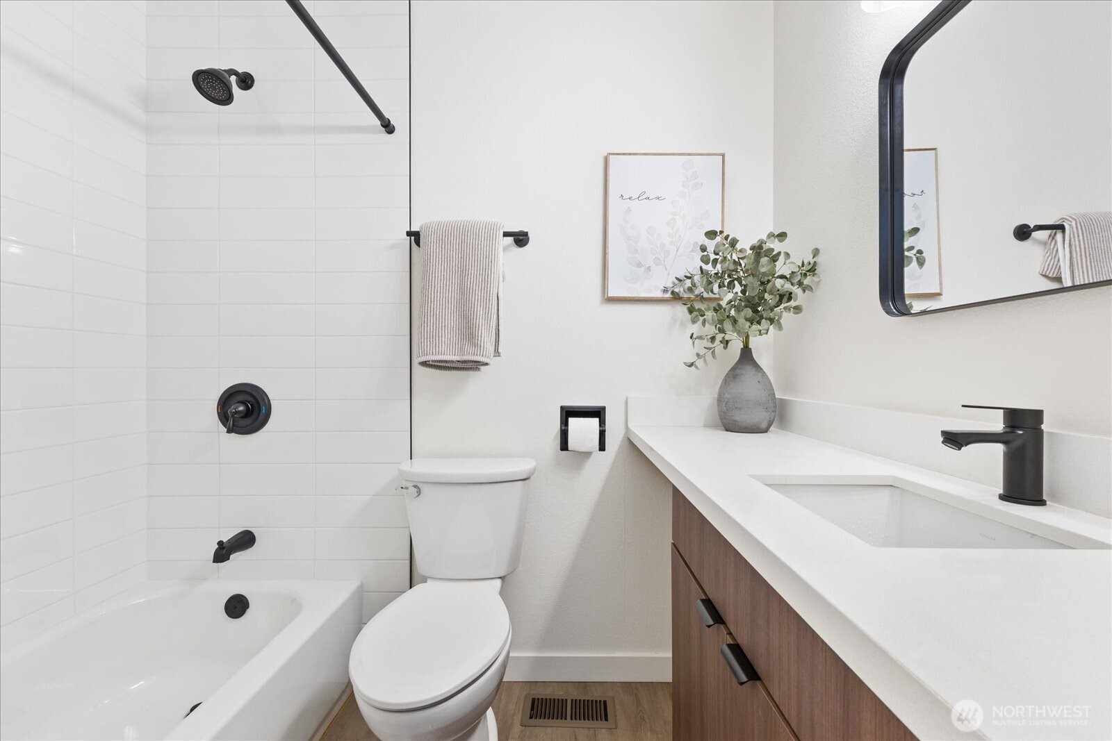 34515 25th Avenue Southwest Federal Way, WA 98023 - Photo 14 of 31 a bathroom with a sink a toilet and shower