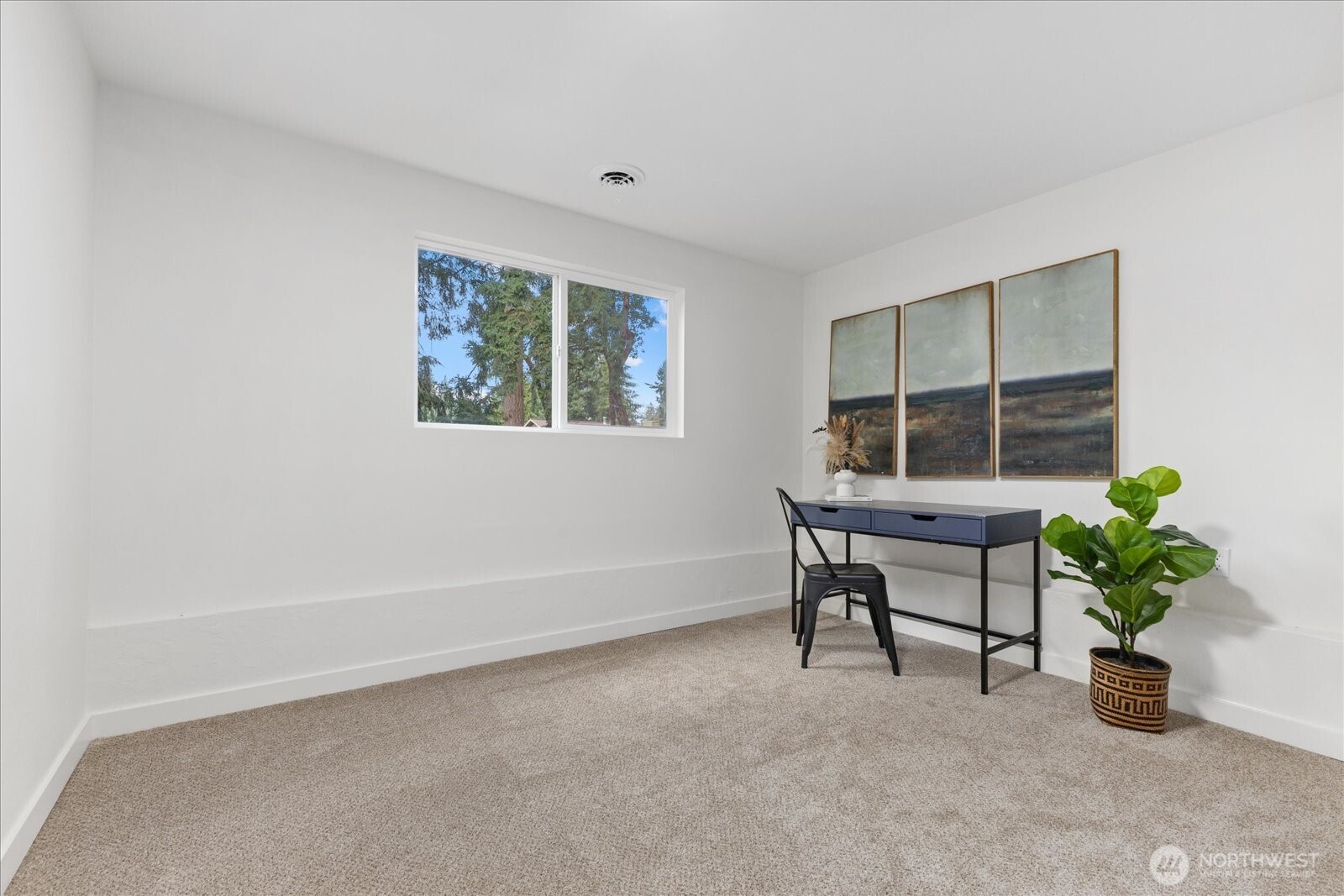 34515 25th Avenue Southwest Federal Way, WA 98023 - Photo 19 of 31 a workspace with furniture and a potted plant