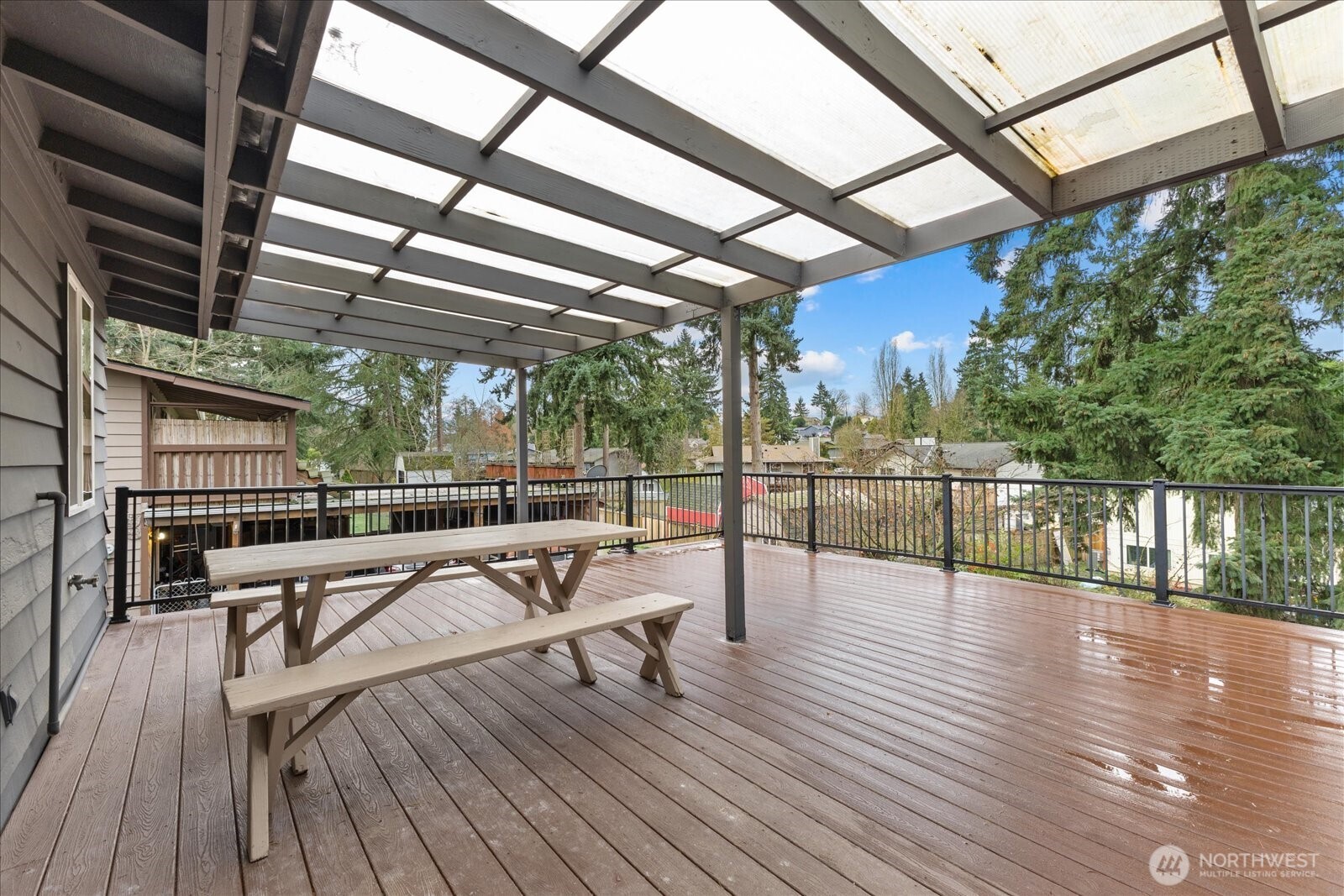 34515 25th Avenue Southwest Federal Way, WA 98023 - Photo 9 of 31 a view of a roof deck with couches and wooden floor