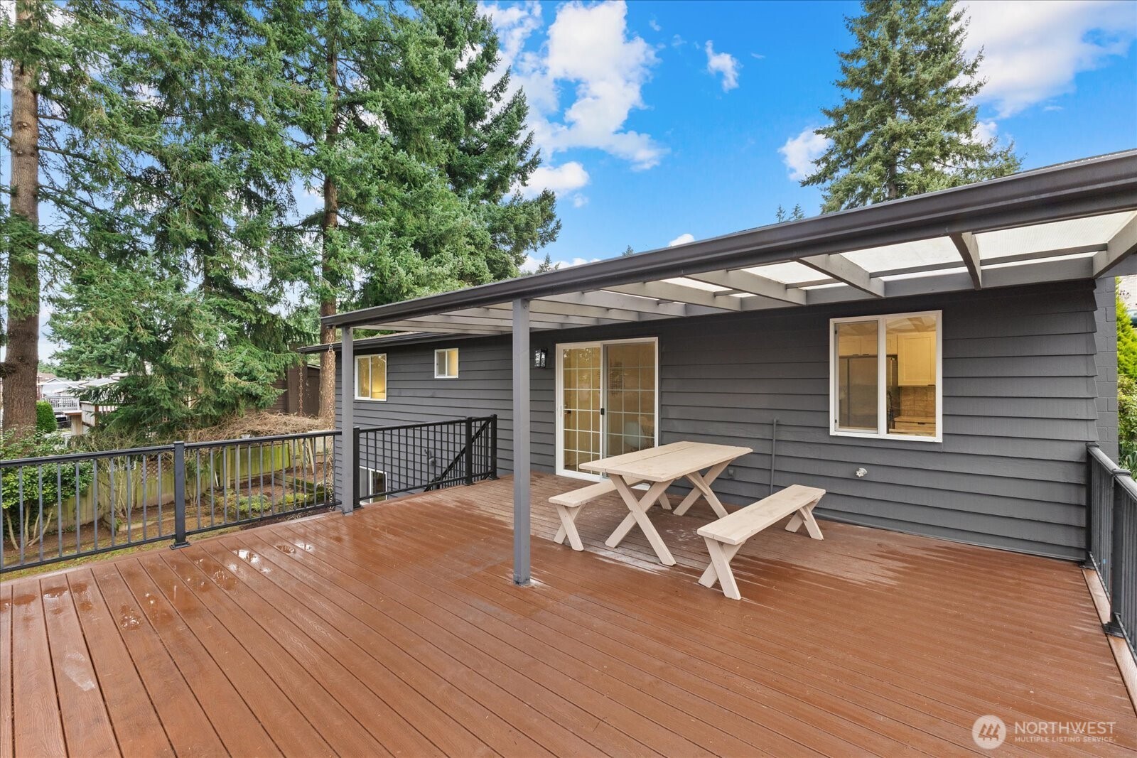 34515 25th Avenue Southwest Federal Way, WA 98023 - Photo 10 of 31 a view of a house with wooden deck and furniture