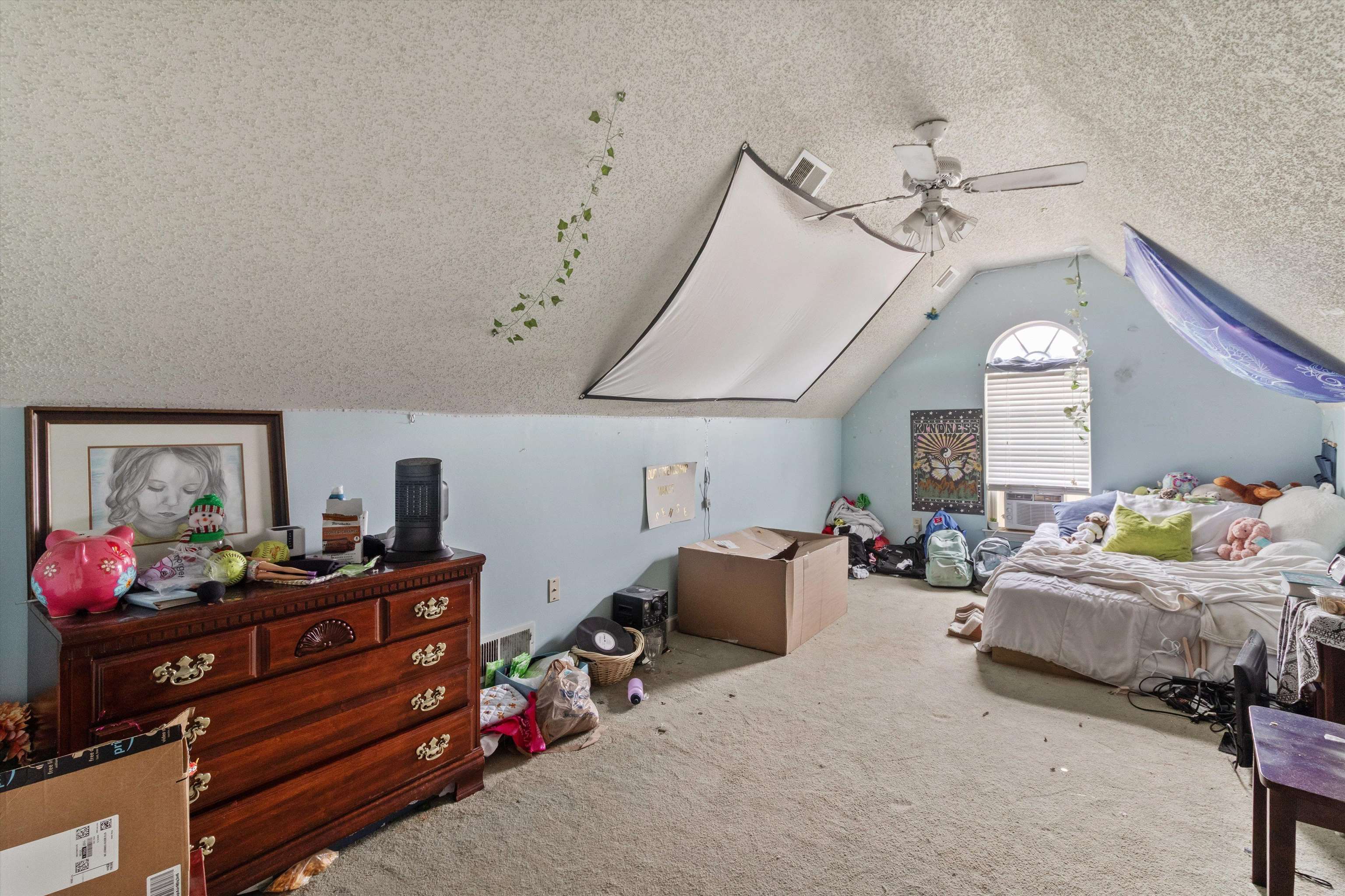 6712 Booth Forrest Drive Bartlett, TN 38135 - Photo 24 of 27 a bedroom with bed and window