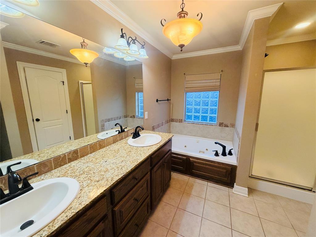 513 Fox Cove Haughton, LA 71037 - Photo 12 of 15 a bathroom with a granite countertop sink and a mirror