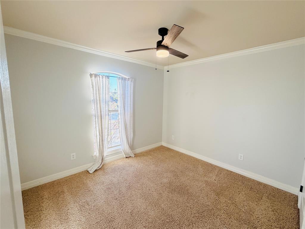 513 Fox Cove Haughton, LA 71037 - Photo 7 of 15 a view of an empty room and chandelier fan