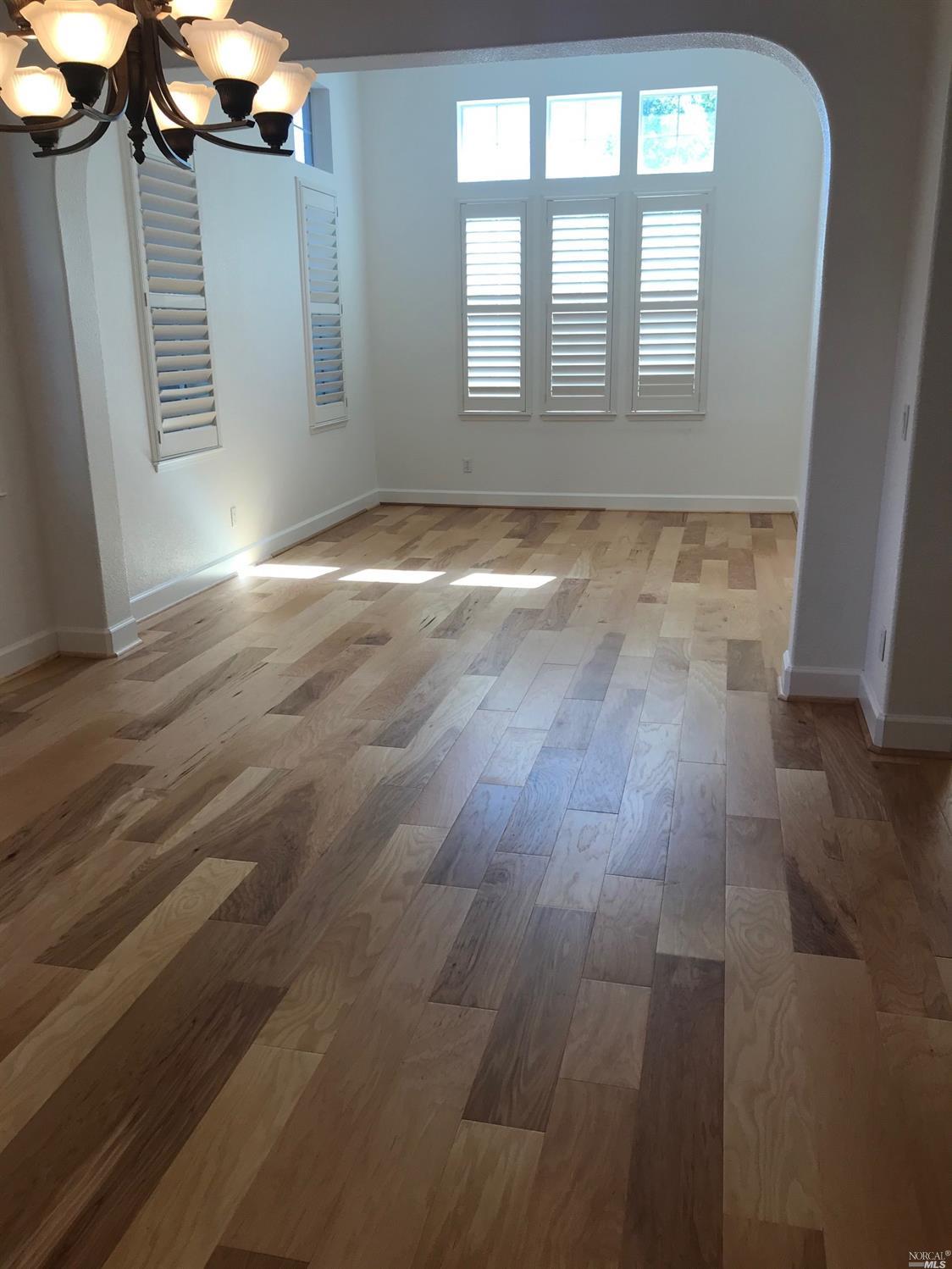 80 Pinheiro Circle Novato, CA 94945 - Photo 3 of 10 Dining Room and Living room areas new hardwood flooring