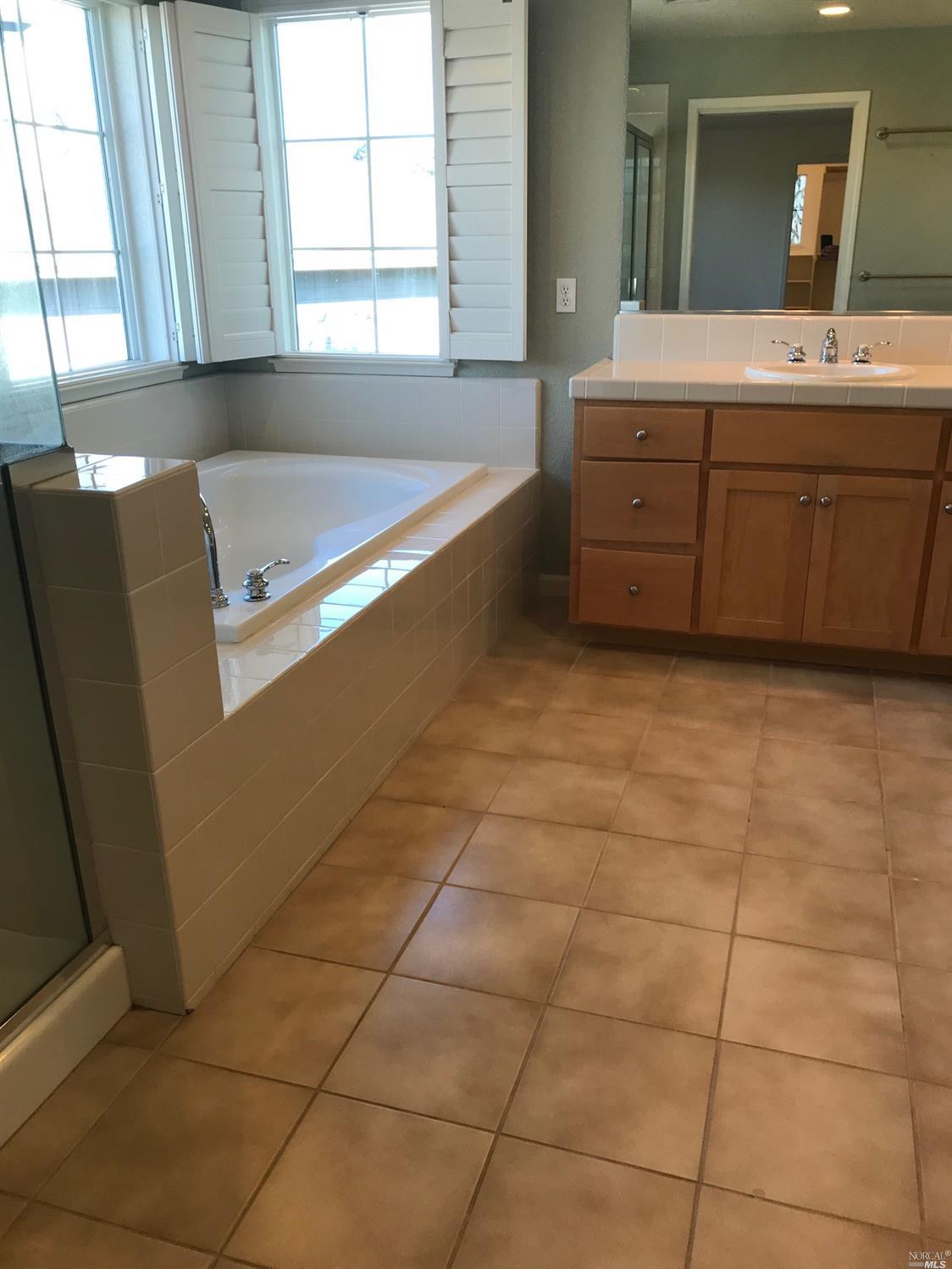 80 Pinheiro Circle Novato, CA 94945 - Photo 8 of 10 Master bath with dual sinks tub and shower