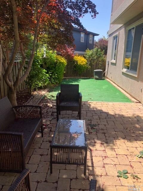 80 Pinheiro Circle Novato, CA 94945 - Photo 10 of 10 back patio with turf yard