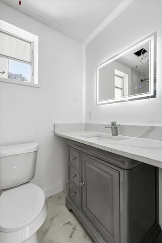 an empty room with sliding glass door