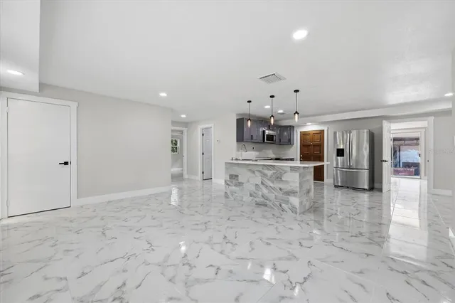 a view of a kitchen with a sink