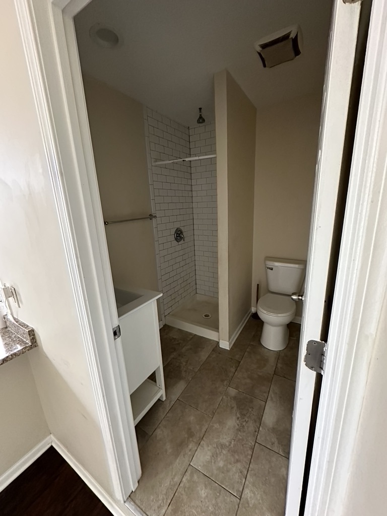 321 West 24th Street, Unit 3R Chicago, IL 60616 - Photo 11 of 11 a bathroom with a sink and a toilet