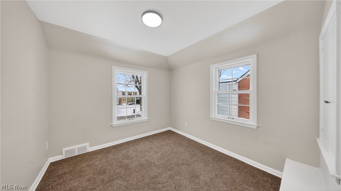 16811 Invermere Avenue Cleveland, OH 44128 - Photo 37 of 47 Carpeted spare room with baseboards