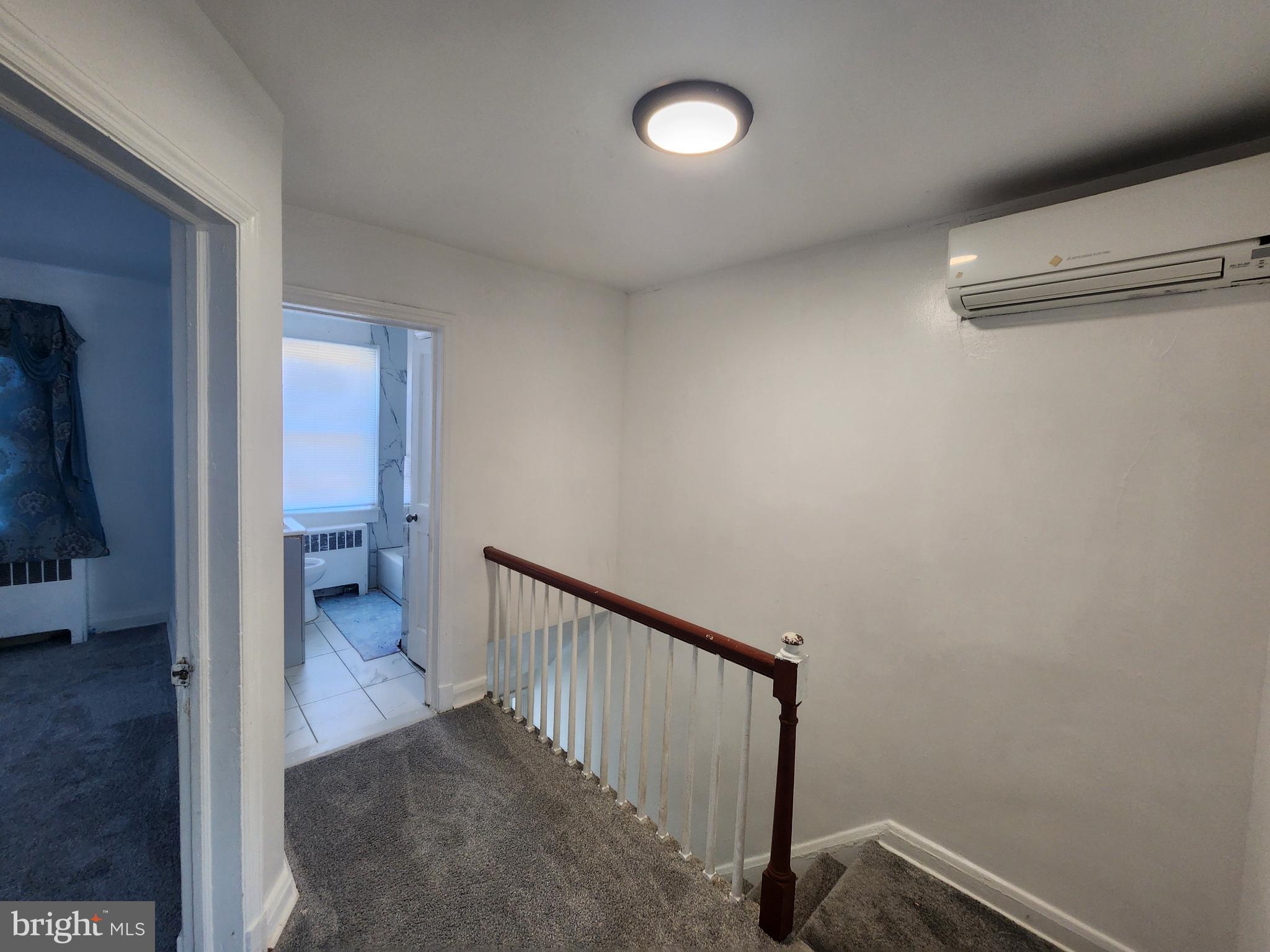 3507 Pelham Avenue Baltimore, MD 21213 - Photo 32 of 36 a view of a hallway view with staircase