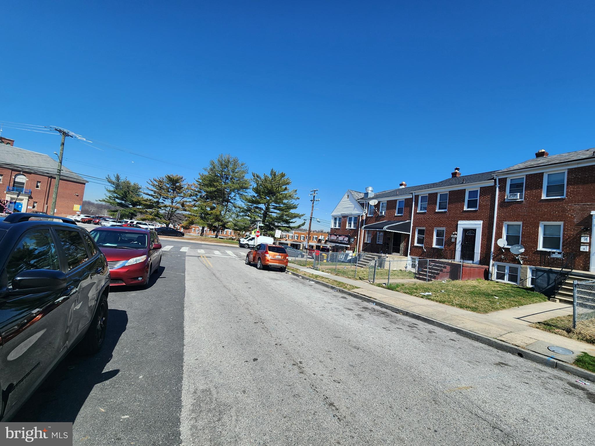 3507 Pelham Avenue Baltimore, MD 21213 - Photo 4 of 36 a view of a street with cars