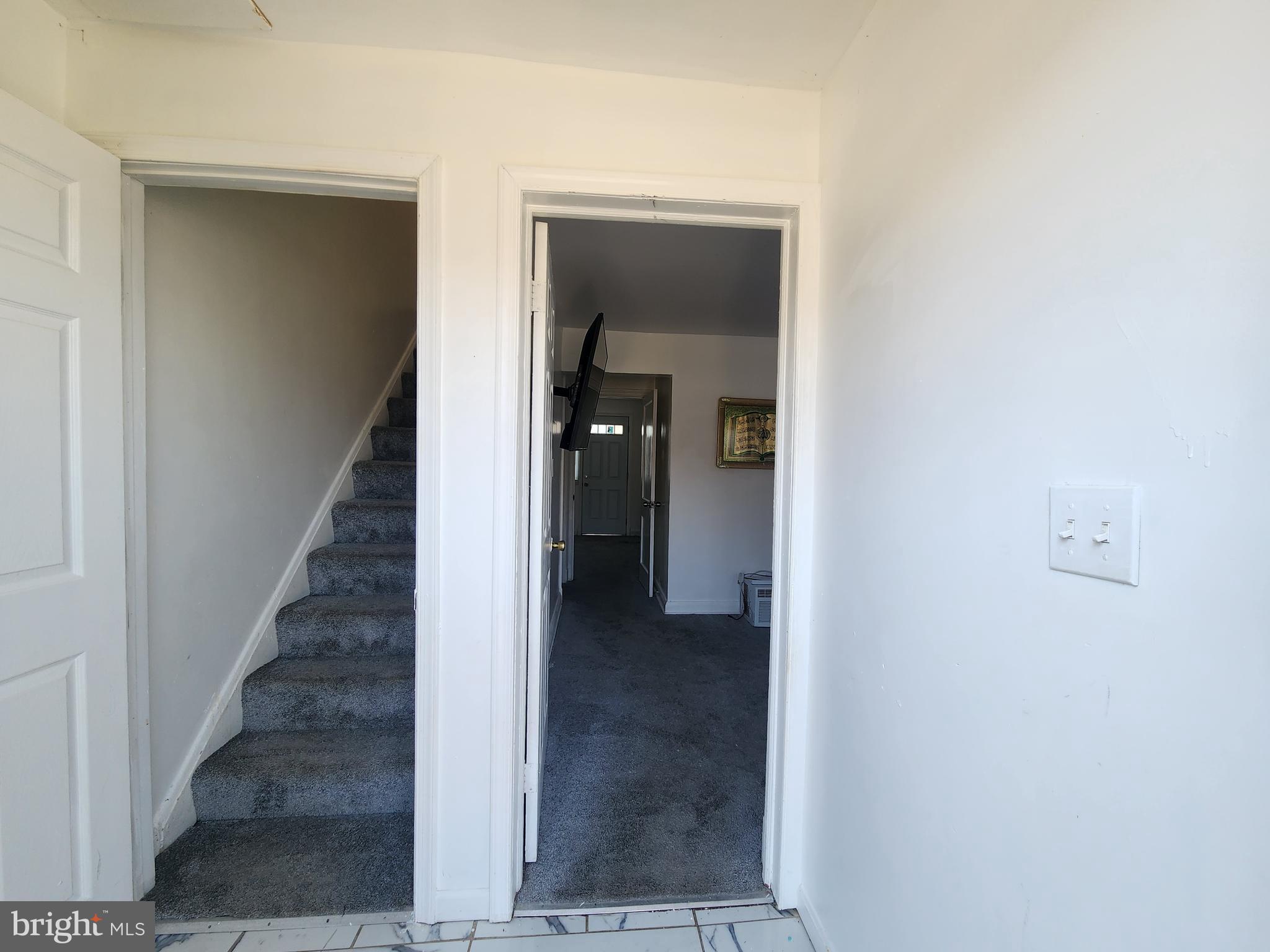 3507 Pelham Avenue Baltimore, MD 21213 - Photo 5 of 36 a view of a hallway with staircase