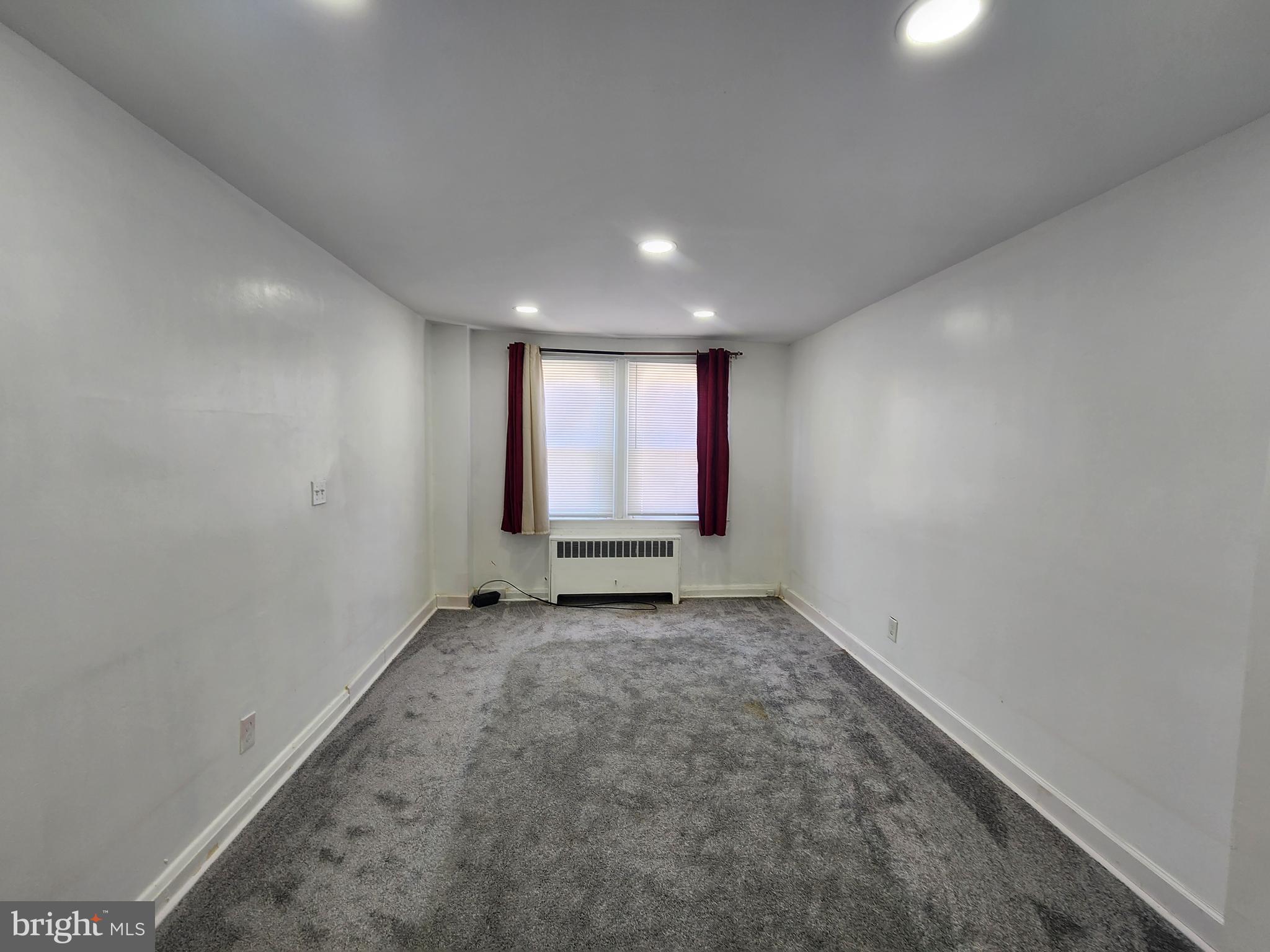 3507 Pelham Avenue Baltimore, MD 21213 - Photo 10 of 36 an empty room with windows