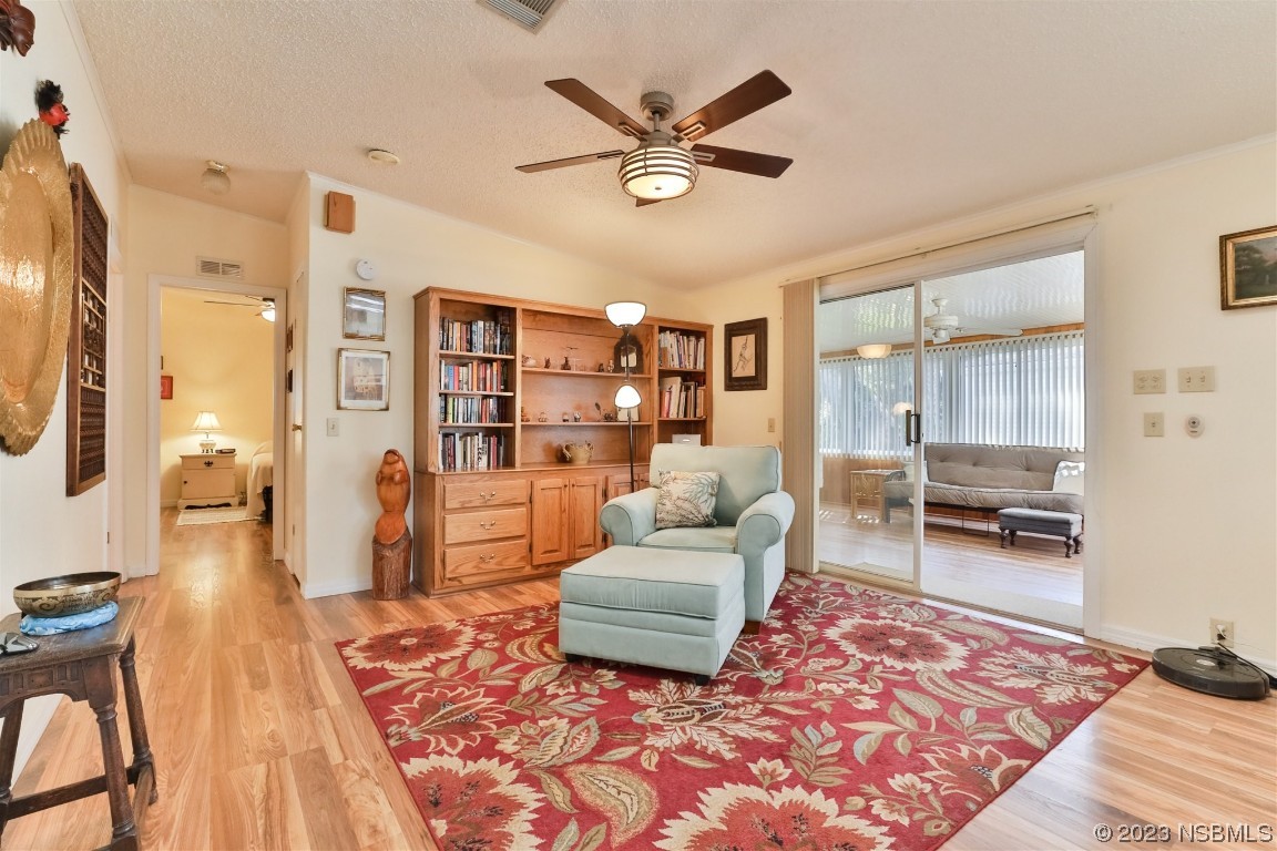 806 Navigators Way Edgewater, FL 32141 - Photo 23 of 59 a living room with furniture and a rug