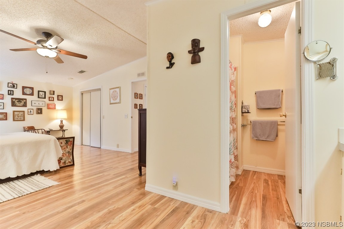 806 Navigators Way Edgewater, FL 32141 - Photo 30 of 59 a view of a room with wooden floor and bathroom