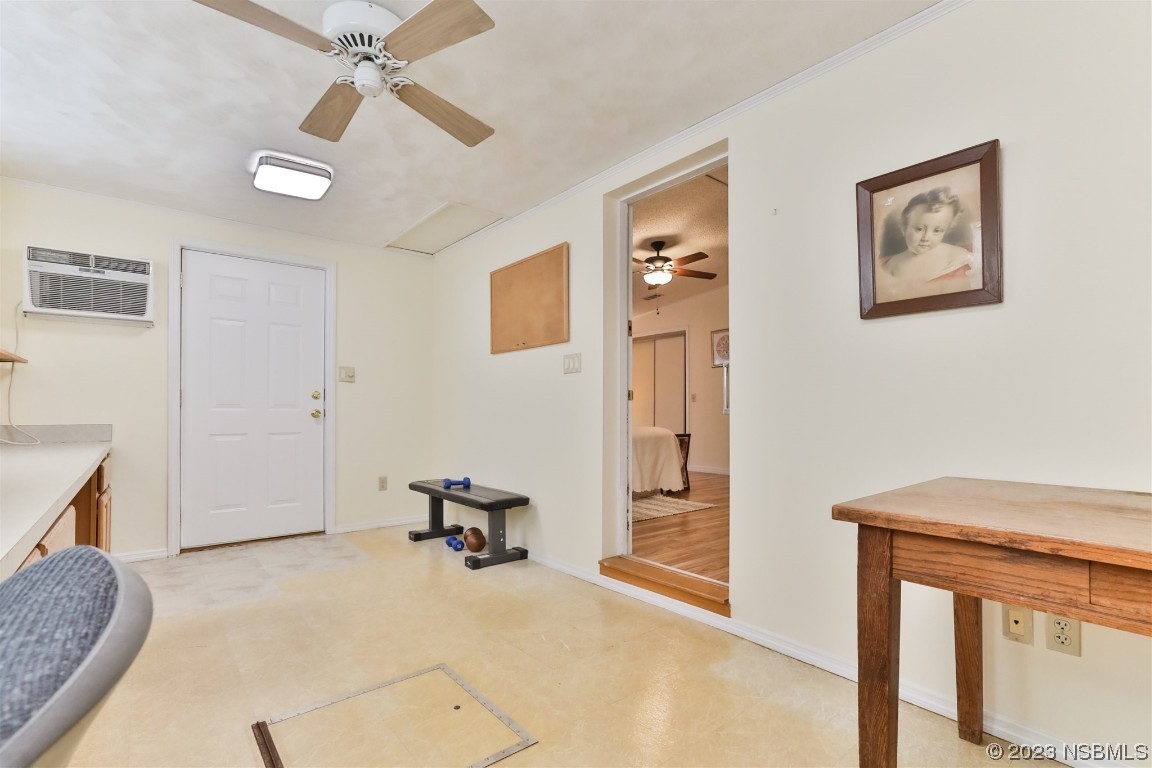 806 Navigators Way Edgewater, FL 32141 - Photo 35 of 59 a view of a livingroom with furniture and a ceiling fan