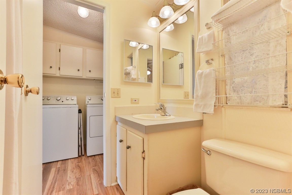 806 Navigators Way Edgewater, FL 32141 - Photo 37 of 59 a bathroom with a sink a toilet and a shower