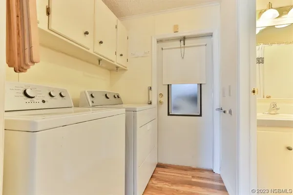 a view of a wooden deck with a bench