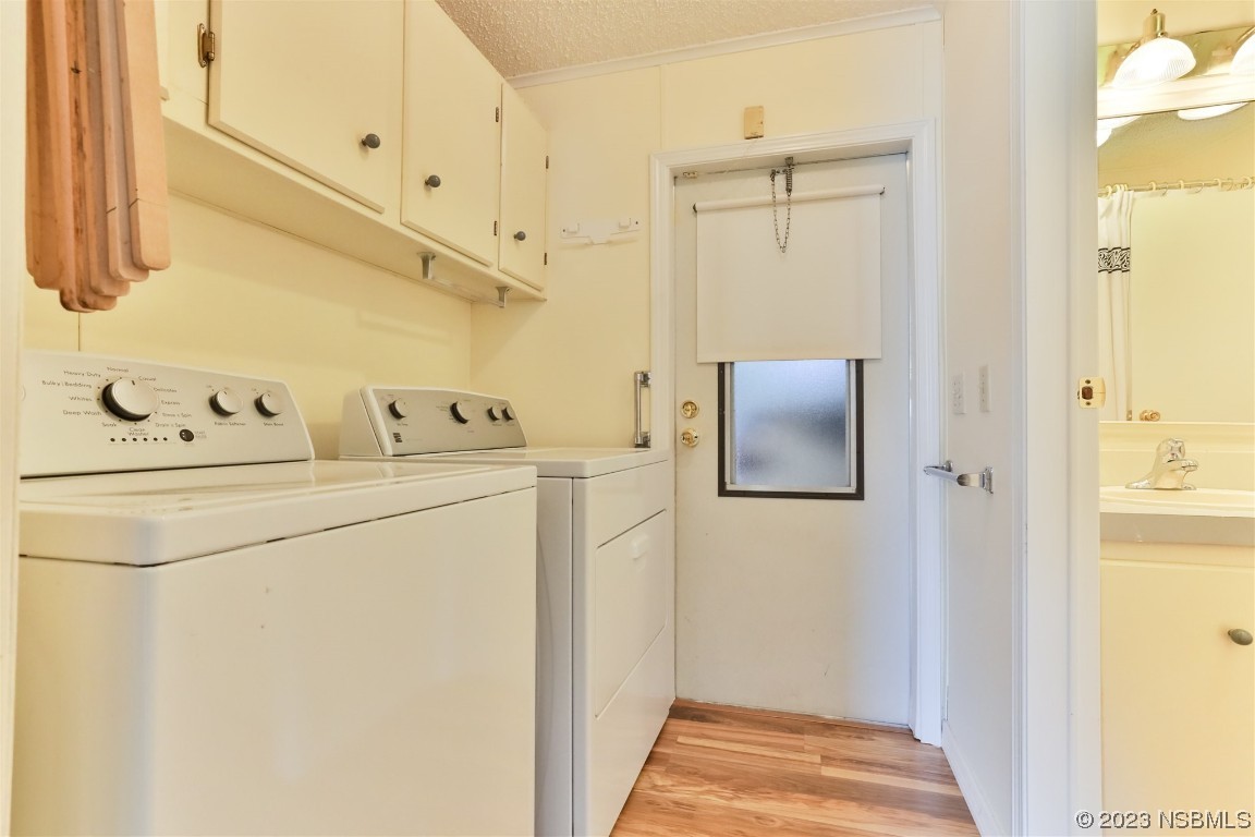 806 Navigators Way Edgewater, FL 32141 - Photo 38 of 59 a utility room with dryer and washer