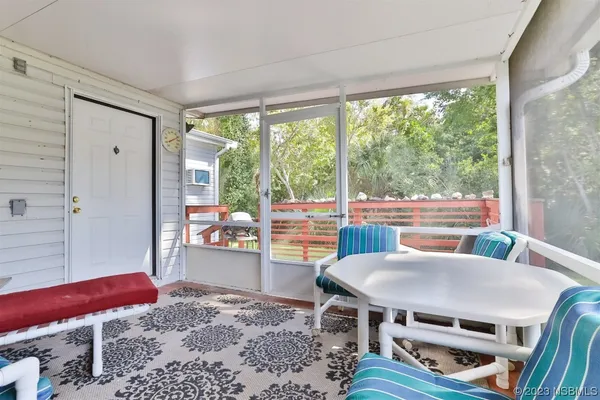 a view of swimming pool from a balcony