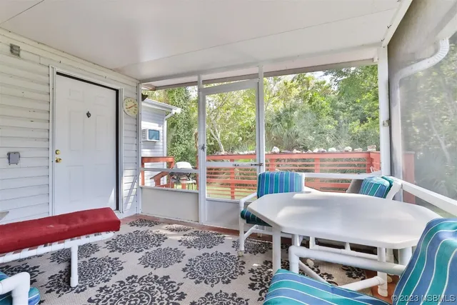 a view of swimming pool from a balcony