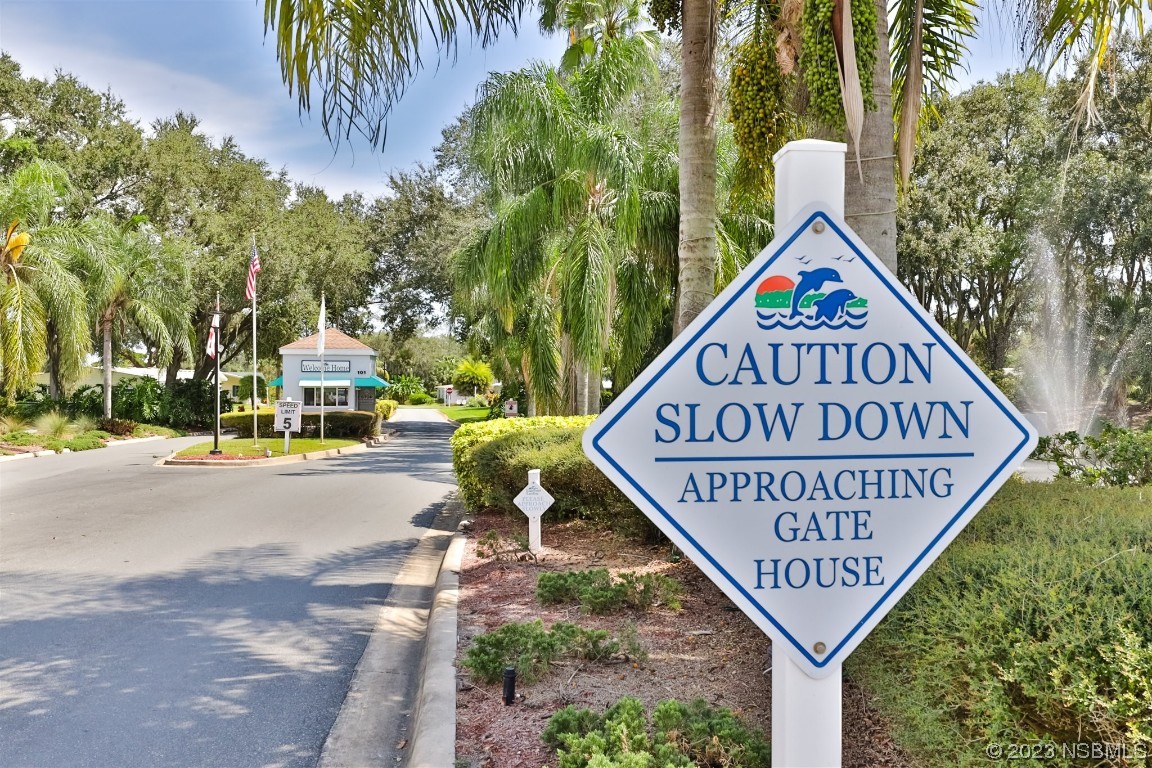 806 Navigators Way Edgewater, FL 32141 - Photo 41 of 59 a view of street sign on a small yard