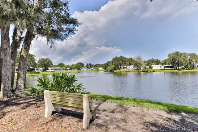 a view of a swimming pool with a sitting space