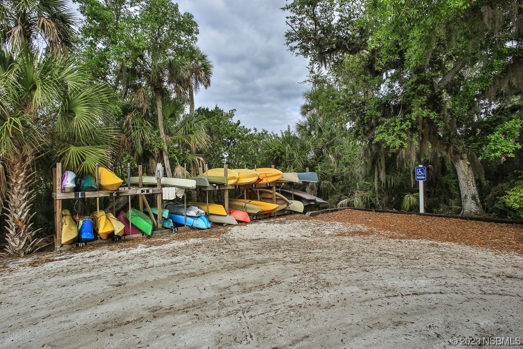 806 Navigators Way Edgewater, FL 32141 - Photo 51 of 59 a view of outdoor space with garden and entertaining space