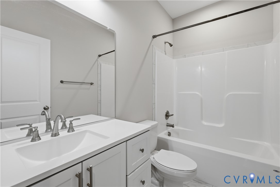 7501 Military Road Amelia Court House, VA 23002 - Photo 27 of 29 Hall Bathroom, tile floor