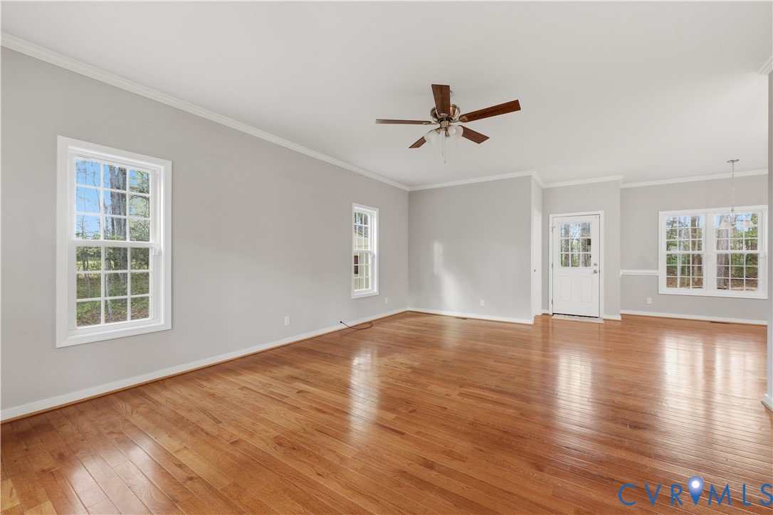 7501 Military Road Amelia Court House, VA 23002 - Photo 10 of 29 Beautiful floors in the Family Room and Dining Noo