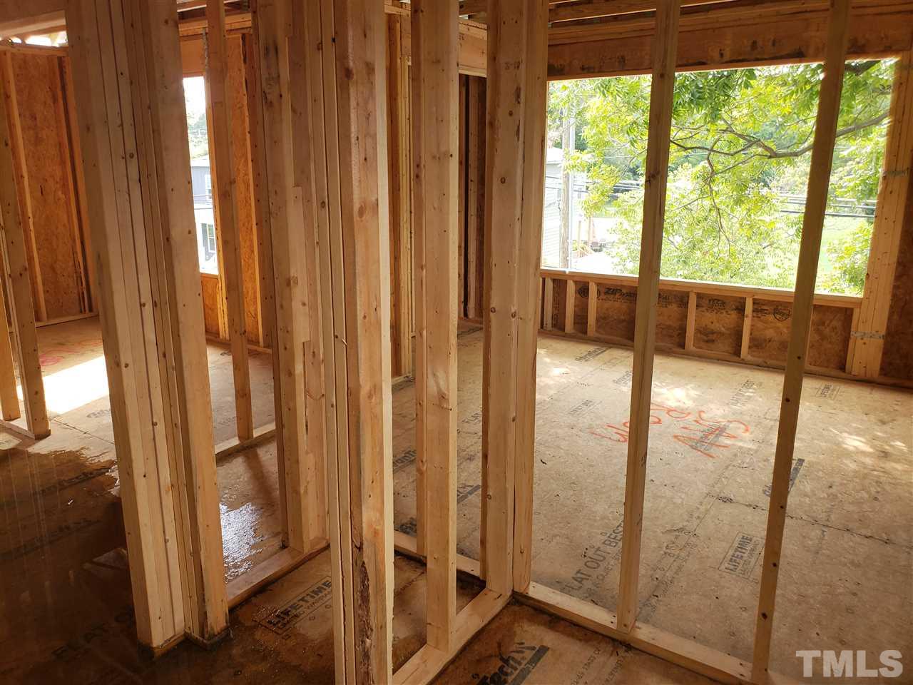 16 Hill Street Raleigh, NC 27610 - Photo 22 of 25 Bathroom upstairs has a towel closet inside and will have shower/tub with tile from tub to ceiling.
