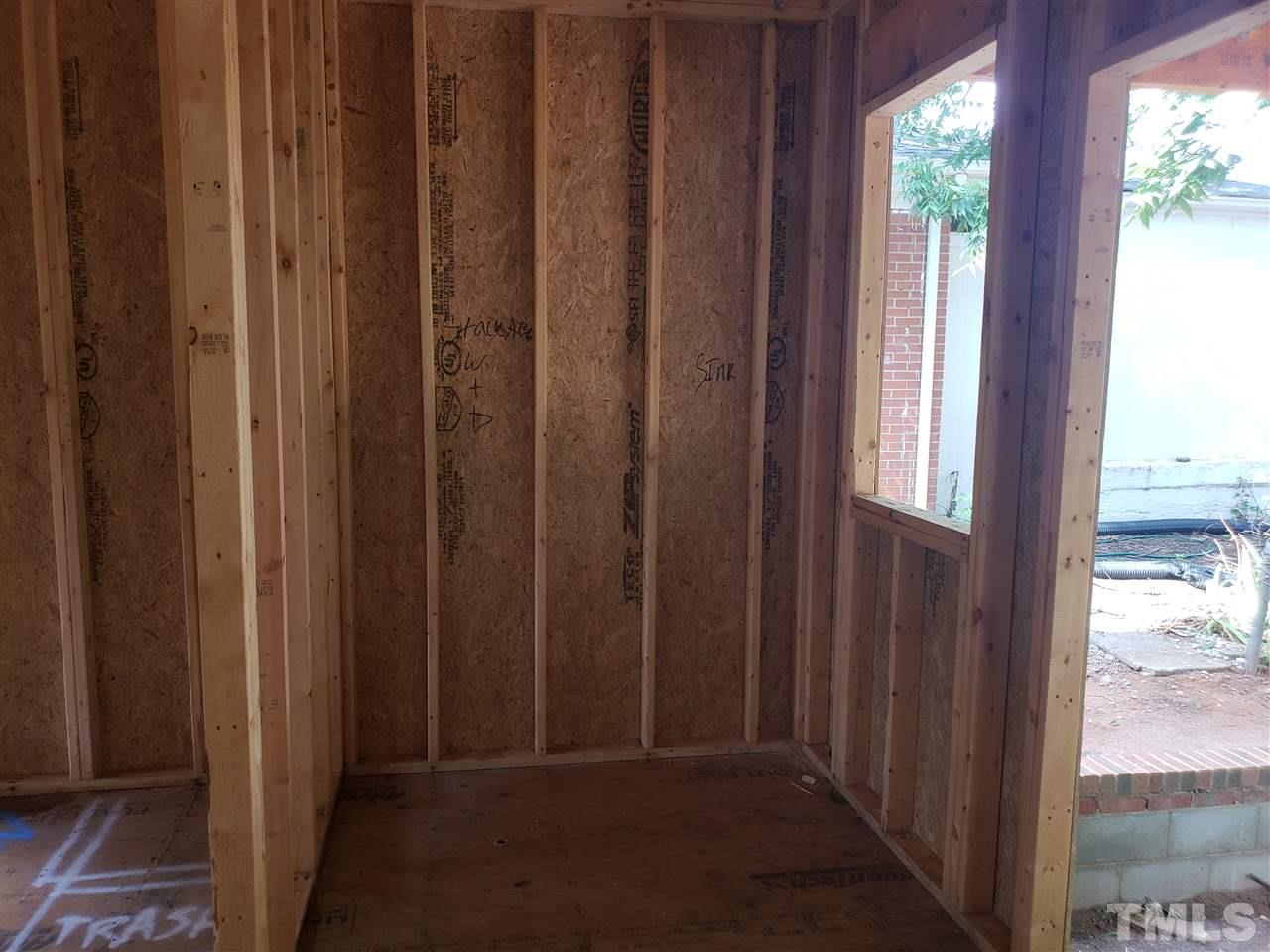 16 Hill Street Raleigh, NC 27610 - Photo 8 of 25 Stackable Washer/Dryer right next to Master Bedroom.