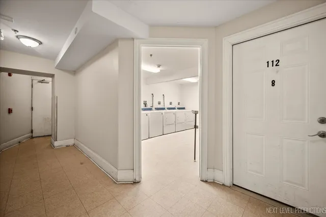 a kitchen with stainless steel appliances granite countertop a refrigerator sink and cabinets