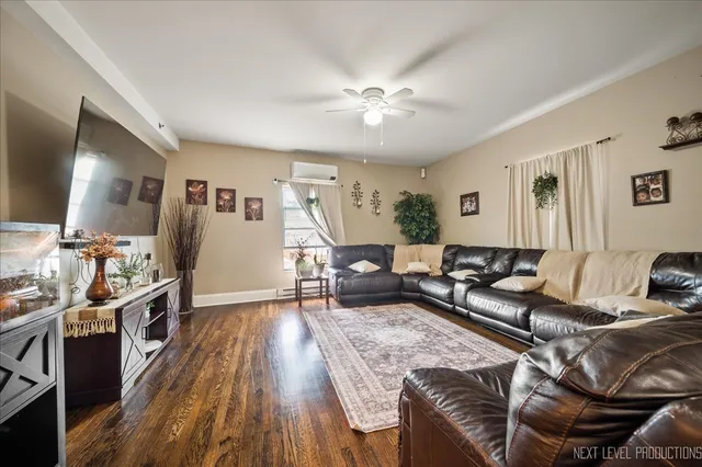 a living room with furniture and a rug