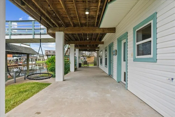 a view of a swimming pool with a patio