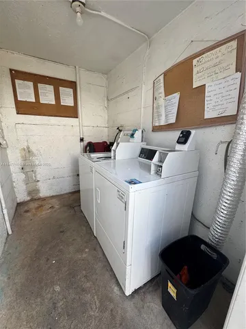 a view of parking house with car parked