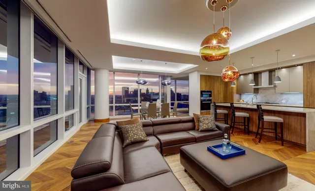 a view of a dining room with furniture window and outside view