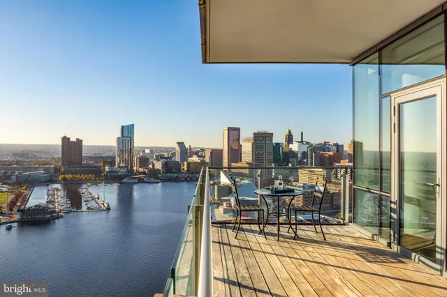 a bathroom with a sink double vanity and a mirror