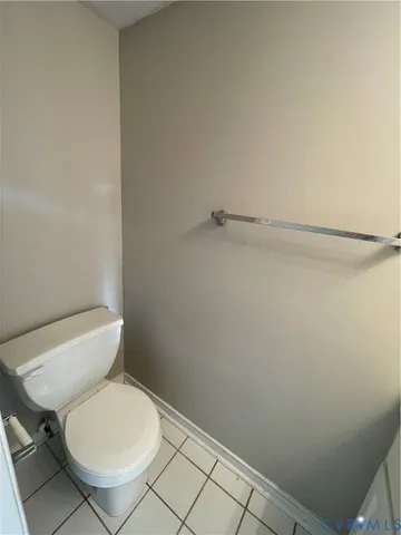 a kitchen with cabinets appliances and a window