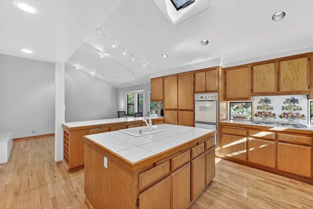 a view of bathroom with washer and dryer
