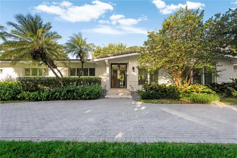 a view of a house with a garden