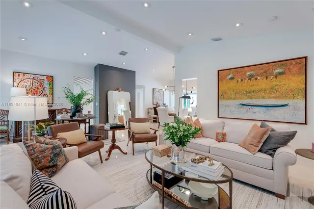 a kitchen with cabinets a sink and appliances