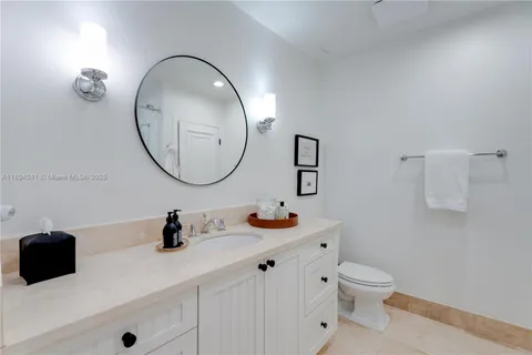 a bedroom with a bed and furniture