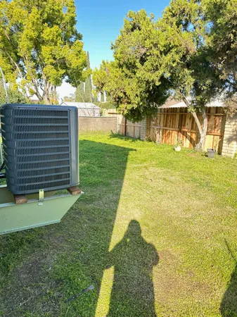 a view of outdoor space and front view of a house